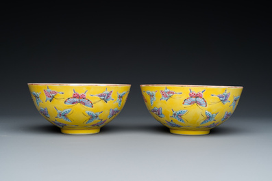 A pair of Chinese famille rose yellow-ground 'butterfly' bowls, Tongzhi mark and of the period