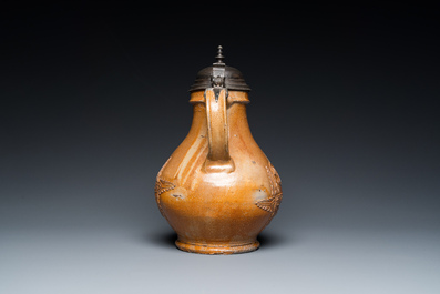 An exceptionally fine pewter-lidded stoneware bellarmine jug with portrait medallions, Cologne, Germany, 2nd quarter 16th C.