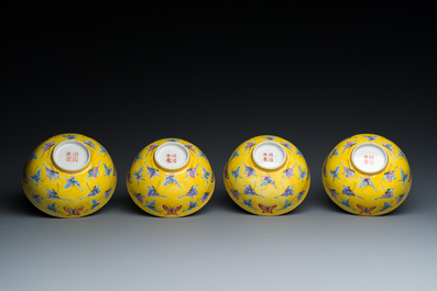 Four Chinese famille rose yellow-ground 'butterfly' bowls, Tongzhi mark and of the period