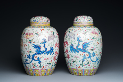 A pair of Chinese famille rose 'phoenix' jars and covers, Ji Xiang Ru Yi 吉祥如意 mark, 19th C.