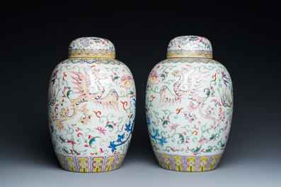 A pair of Chinese famille rose 'phoenix' jars and covers, Ji Xiang Ru Yi 吉祥如意 mark, 19th C.