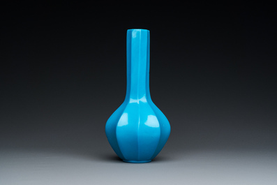 A Chinese turquoise blue Peking glass facetted bottle vase, Qianlong mark and of the period