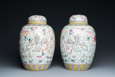 A pair of Chinese famille rose 'phoenix' jars and covers, Ji Xiang Ru Yi 吉祥如意 mark, 19th C.