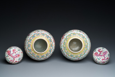 A pair of Chinese famille rose 'phoenix' jars and covers, Ji Xiang Ru Yi 吉祥如意 mark, 19th C.