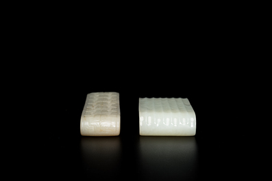 Two fine Chinese white and celadon jade brush rests, Qing