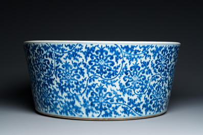 An exceptionally large Chinese blue and white basin with floral scrolls, Kangxi