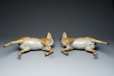 A very fine and large pair of Chinese cloisonn&eacute; models of deer on reticulated wooden stands, 19th C.