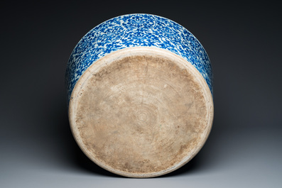An exceptionally large Chinese blue and white basin with floral scrolls, Kangxi