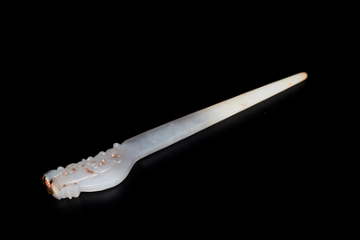 A Chinese white jade hairpin and two jade seal stamps, Qing