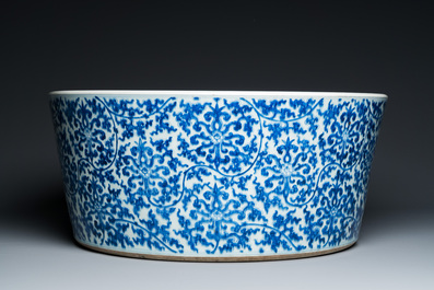 An exceptionally large Chinese blue and white basin with floral scrolls, Kangxi