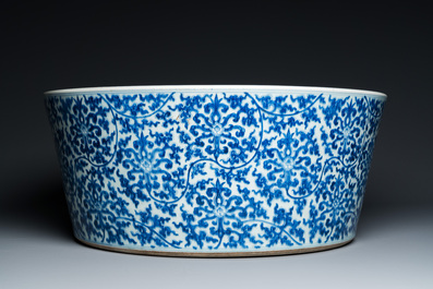 An exceptionally large Chinese blue and white basin with floral scrolls, Kangxi