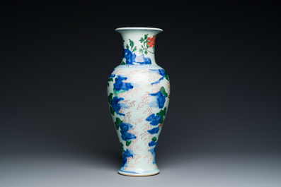 A Chinese wucai 'immortals' vase, Transitional period