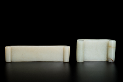 Two fine Chinese white and celadon jade brush rests, Qing