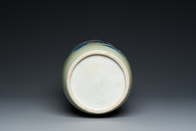 A Chinese celadon-ground blue, white and copper-red rouleau vase, Kangxi