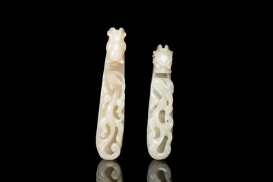 Deux boucles de ceintures finement sculpt&eacute;es en jade blanc, Chine, Qing