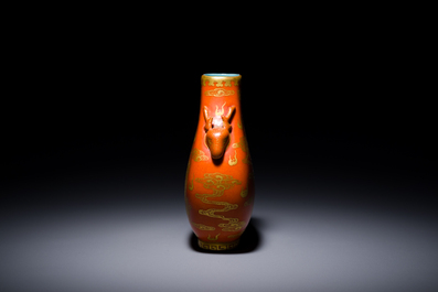 A small Chinese coral-ground 'hu' vase with gilt 'dragon and phoenix' design, Qianlong mark, Qing