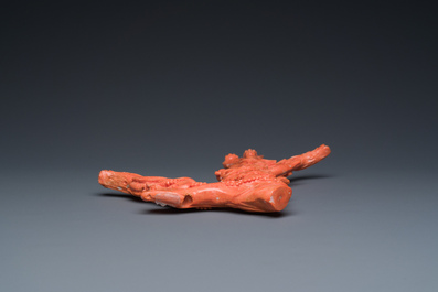 A Chinese red coral figure of a standing Bodhisattva with two dragons, 19/20th C.