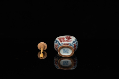 A Chinese blue, white and copper-red snuff bottle, Yongzheng mark and of the period