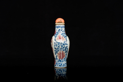A Chinese blue, white and copper-red snuff bottle, Yongzheng mark and of the period