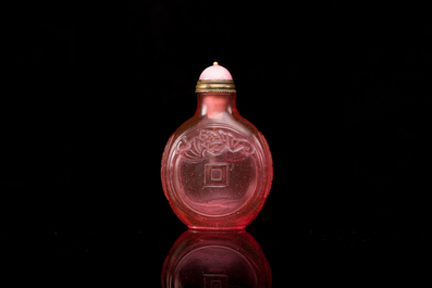 A Chinese ruby-pink glass 'bats' snuff bottle, Qianlong mark and of the period