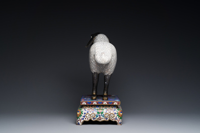 A Chinese cloisonn&eacute; model of a sheep standing on a rectangular base with Arabic inscription, Qing