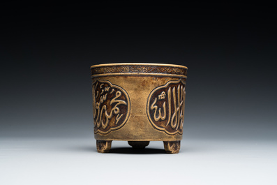 A rare Chinese bronze cylindrical tripod censer with Arabic
