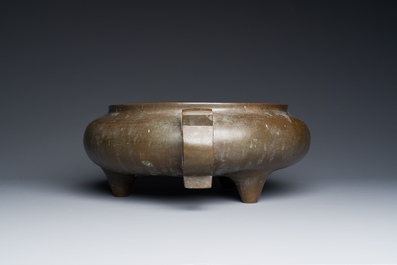 A very large Chinese bronze tripod censer, sixteen-character Xuande mark, 17/18th C.