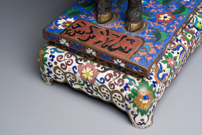 A Chinese cloisonn&eacute; model of a sheep standing on a rectangular base with Arabic inscription, Qing