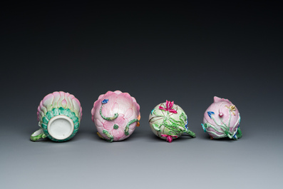 Two Chinese relief-decorated famille rose 'lotus' cups and saucers and two jugs, Yongzheng