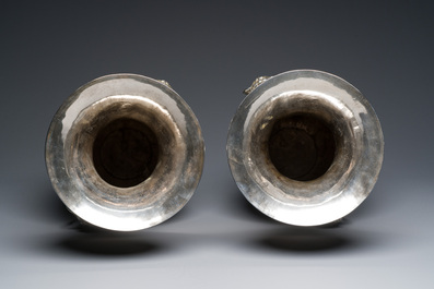 A pair of Chinese silver vases depicting 'Guo Ziyi's birthday', Qingyun 慶雲 mark, 19th C.