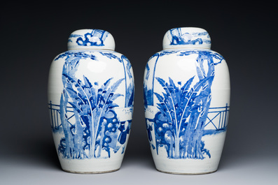 A pair of large Chinese blue and white jars and covers with ladies playing a game of go, 19th C.