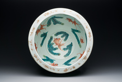 A Chinese famille rose green sgraffito-ground 'antiquities' fish bowl, 19th C.