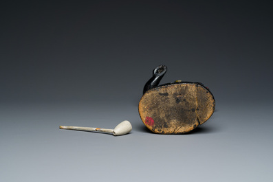 An English polychromed wood sculpture of a pipe-smoking Indian from a tobacco store, 18th C.