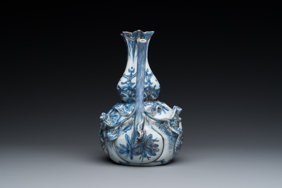 A Chinese blue and white 'pomegranate' kendi with gilt highlights, Wanli
