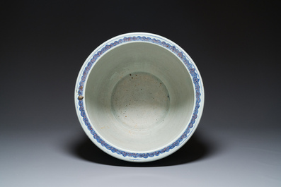 An exceptional massive Chinese blue, white and copper-red fish bowl with antiquities and 'Master of the rocks'-style panels, Kangxi