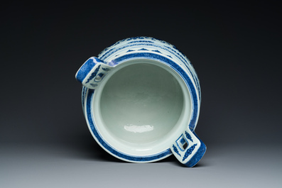 A large Chinese blue and white 'bajixiang' tripod censer with lotus scrolls, Qianlong