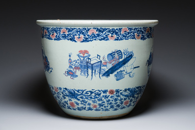 An exceptional massive Chinese blue, white and copper-red fish bowl with antiquities and 'Master of the rocks'-style panels, Kangxi