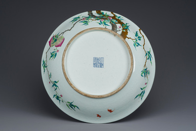 A fine and large Chinese famille rose 'nine peaches' dish, Qianlong mark, 19th C.