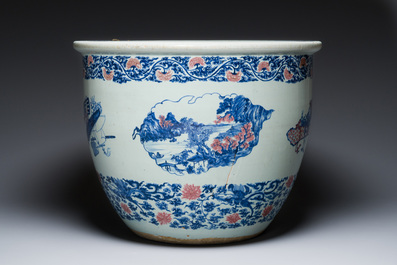 An exceptional massive Chinese blue, white and copper-red fish bowl with antiquities and 'Master of the rocks'-style panels, Kangxi