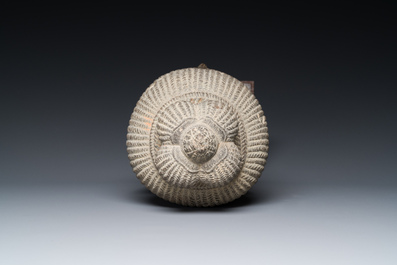 A Khmer polished sandstone head of Uma in Baphuon-style, Angkor period, Cambodia, 11th C.