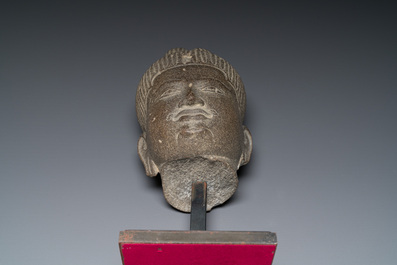 A Khmer polished sandstone head of Uma in Baphuon-style, Angkor period, Cambodia, 11th C.