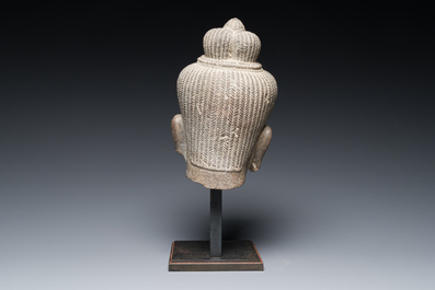 A Khmer polished sandstone head of Uma in Baphuon-style, Angkor period, Cambodia, 11th C.