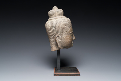 A Khmer polished sandstone head of Uma in Baphuon-style, Angkor period, Cambodia, 11th C.