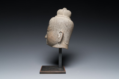 A Khmer polished sandstone head of Uma in Baphuon-style, Angkor period, Cambodia, 11th C.