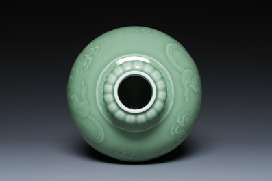 A Chinese monochrome celadon-glazed 'dragon' vase, 19th C.