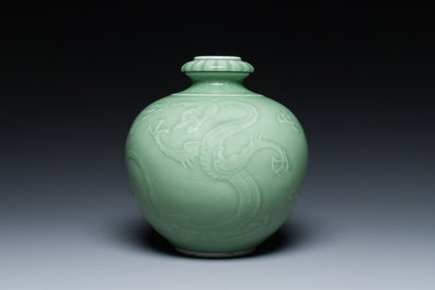 A Chinese monochrome celadon-glazed 'dragon' vase, 19th C.