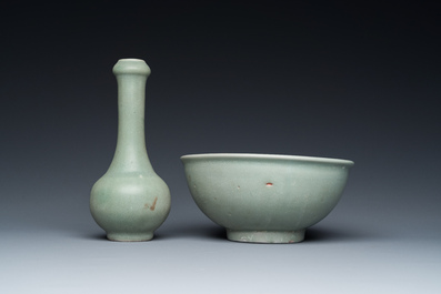 A Chinese celadon-glazed bottle vase and two bowls, Yuan/Ming