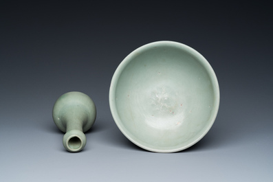 A Chinese celadon-glazed bottle vase and two bowls, Yuan/Ming