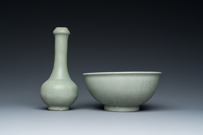 A Chinese celadon-glazed bottle vase and two bowls, Yuan/Ming