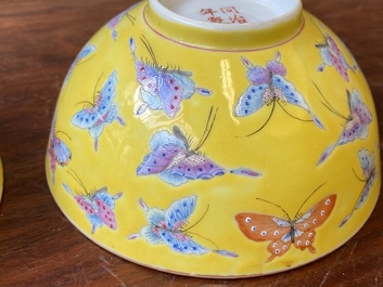 A pair of Chinese famille rose yellow-ground 'butterfly' bowls, Tongzhi mark and of the period